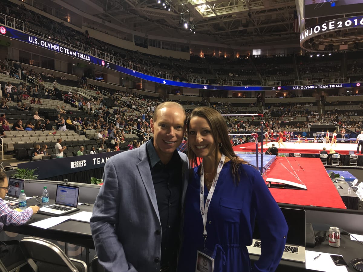Gina Pongetti Angeletti and Inside Gymnastics publisher Chris Korotky at the press tables beside the competition floor at the 2016 US Olympic Team Trials in San Jose.